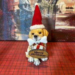 Festive  Dog Statue with Red and White Santa Hat